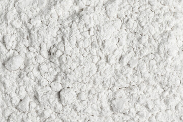 Organic white wheat flour. Top view, full frame photo.