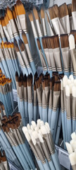 Paint brushes. Artist's paint brushes. Vertical photo.