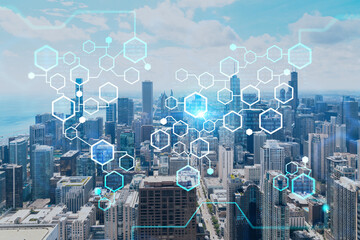 Aerial panorama city view of Chicago downtown area and Lake, day time, Illinois, USA. Birds eye view, skyscrapers, financial district. Decentralized economy. Blockchain, cryptography concept, hologram