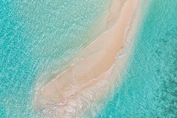 Relaxing aerial beach, summer vacation tropical Mediterranean landscape banner. Waves surf amazing blue ocean lagoon, sea shore coastline. Beautiful aerial drone top view. Peaceful beach, seaside surf