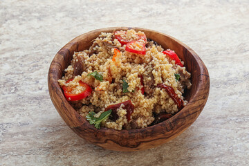 Arabic cous cous with meat and tomato