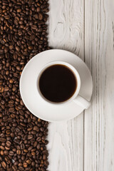a cup of coffee on wooden table 