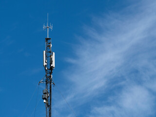 Communication antenna on a blue sky background