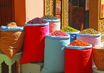 Group colorful bags with dried fruits and spices on maroccan oriental arabian market souk -...
