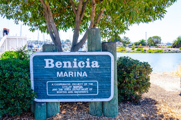 A sign at the entrance to Benicia Marina with information about the Marina. A sunny day with blue...