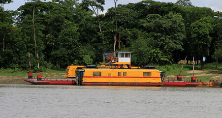 Ferry Boat carry passengers and vehicles for Crossing the river.
