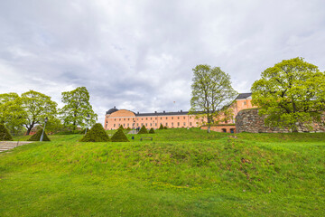 Obraz premium Beautiful view of Royal Palace with green lawn to building in foreground. Sweden.