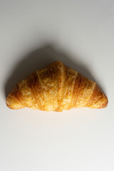 croissant with hardlight, topview, isolated on white
