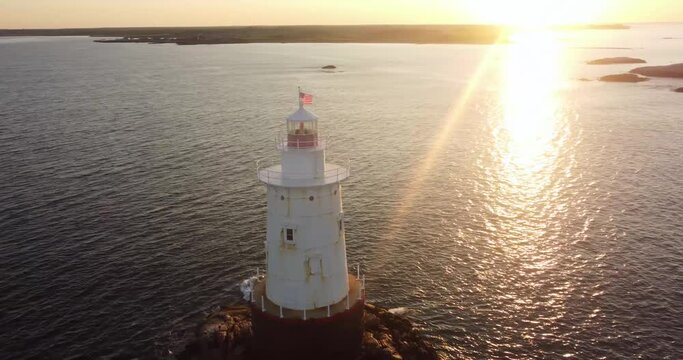 07/10/2022 - Little Compton, RI USA - Early morning video of the Sakonnet Point Light (West Island Light) between Little Compton and Tiverton Rhode Island, at Sakonnet River and Atlantic Ocean.	