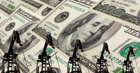 Silhouette of oil drilling pump on background of US Dollar