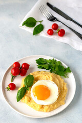 Polenta with fried egg for breakfast.