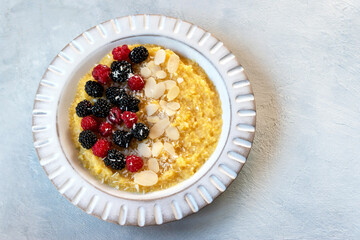 Polenta with berries for breakfast.