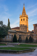 Kings garden and Las Pelayas monastery tower at sunset in Oviedo old town.