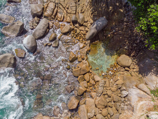 Aerial view from drone of Machabee Rock Pool at Mahé Island taken in the morning light