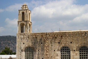 Fototapeta na wymiar Bell tower and windows of the historic church