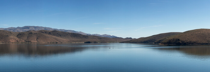 Panoramic View of Lake surrounded by Mountains on a Sunny Day. Summer Season. Topaz Lake, Nevada, United States. Near California. Nature Background. Panorama