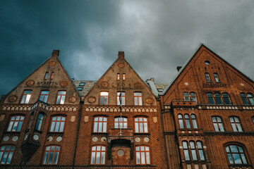 Fototapeta na wymiar Bergen City Center. Cloudy sky, colourful typical houses. 