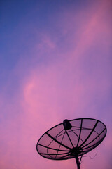 Silhouette satellite Dish on Twilight sky Background.
