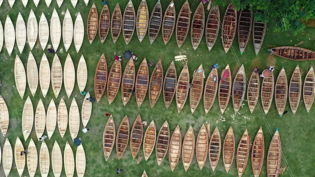 Hundreds of wooden boats are prepared for sale at a market since the monsoon season is coming in Manikganj, Bangladesh.