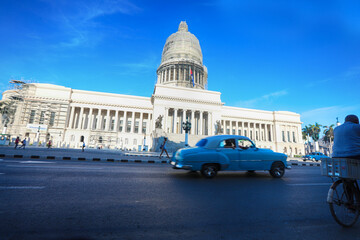 Capitolio building Havana, Cuba with vintage old american cars