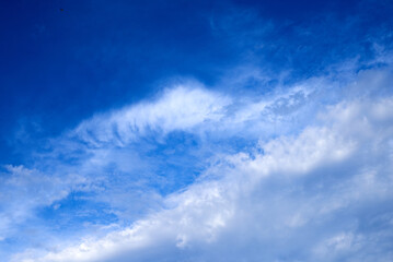 Naklejka na ściany i meble Photo of cirrus clouds and blue sky