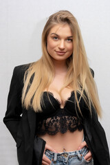Fototapeta premium portrait, beautiful, sexy, girl, 20-25 years old, long, hair, black, top, jacket, white, background, looking, straight, camera, woman, caucasian, young, man, blonde, lady, elegance, studio, beauty, po