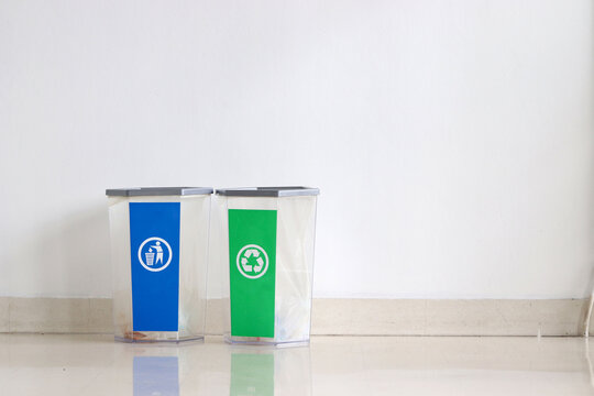Two trash bins that help in separating waste