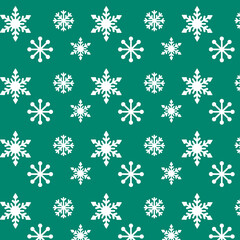 Seamless pattern with white snowflakes vector illustration. Green background.