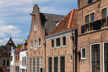 Facades of old monumental buildings in the historic center of the Dutch city of Deventer.