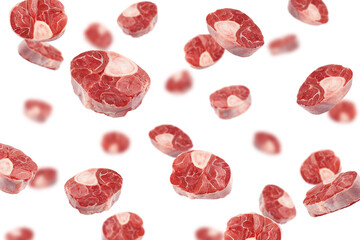 Falling beef shank, osso bucco steak, isolated on white background, selective focus