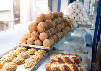 sweet foods at the patisserie counter, front view - obrazy, fototapety, plakaty