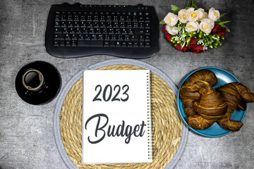 Budget 2023 written on notebook. Business and 2023 budgeting concept