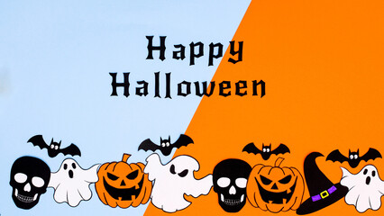 Happy Halloween blue and orange background with scary stickers on the bottom. Flat lay