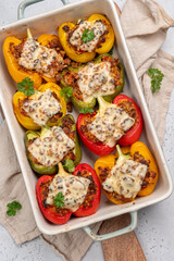Colorful peppers stuffed with meat, bulgur and cheese