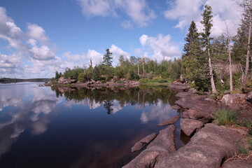 reflection of trees in Isabella lake in the Boundary Waters Canoe area Minnisota