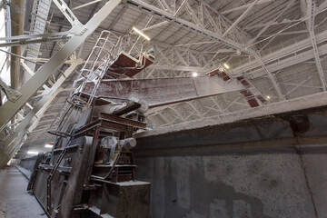 Loading equipment in warehouse of chemical plant.