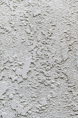 White textured background. Wall with textured coating