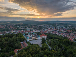 Historic church above the city in Europe at sunset