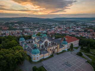 Historic church above the city in Europe at sunset