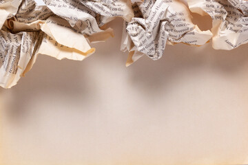 Crumpled book paper with text at aged background.  Scriptwriter creative concept