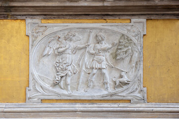 Marble fresco with angel person and a dog