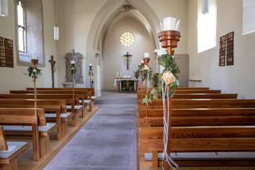Catholic church decorated interiors, inside the church, wedding postcard invitation