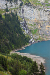 Panoramic summer view of the Oeschinensee (Oeschinen lake) and the alps on the other side near Kandersteg, Berner Oberland, Switzerland, Europe