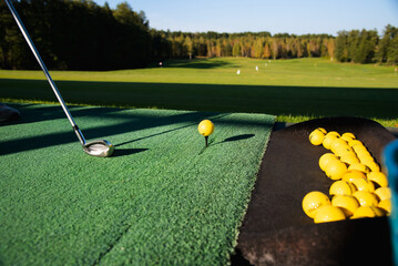 close-up of a club before hitting a golf ball