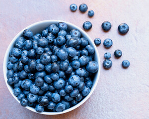 blueberries in a bowl on the table top view