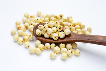 Dried lotus seeds on white background.