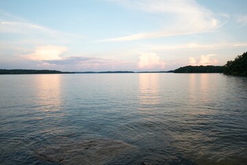 Clouds floating over a calm lake