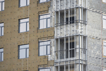 Insulation of external wall building with special insulating material