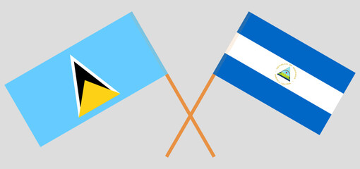 Crossed flags of Saint Lucia and Nicaragua. Official colors. Correct proportion