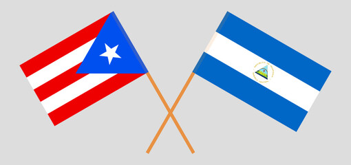 Crossed flags of Puerto Rico and Nicaragua. Official colors. Correct proportion